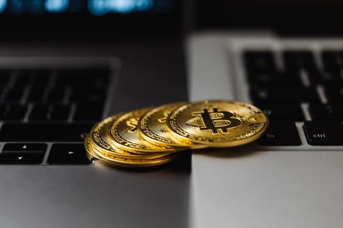 crypto casino explained bitcoin coins on laptop guide